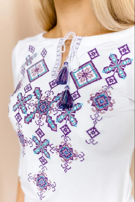 Women's short sleeve white shirt with cross-stitch embroidery. Purple